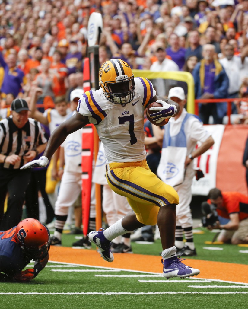 LSU running back Leonard Fournette (7) runs for a touchdown during the first half of an NCAA college football game against Syracuse on Saturday, Sept. 26, 2015, in Syracuse, N.Y. (AP Photo/Mike Groll)