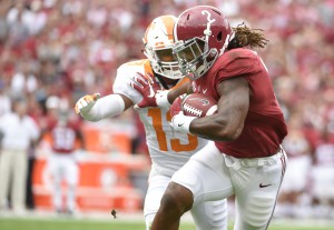 Oct 24, 2015; Tuscaloosa, AL, USA; Alabama Crimson Tide running back Derrick Henry (2) carries for a touchdown against Tennessee Volunteers defensive back Malik Foreman (13) during the first quarter at Bryant-Denny Stadium. Mandatory Credit: John David Mercer-USA TODAY Sports