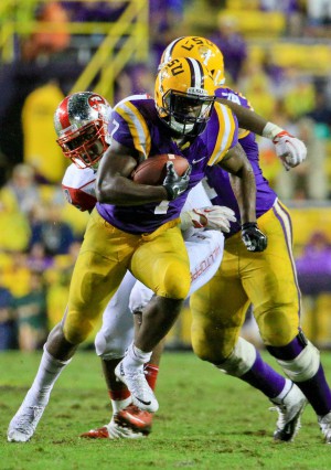 Oct 24, 2015; Baton Rouge, LA, USA; LSU Tigers running back Leonard Fournette (7) runs against the Western Kentucky Hilltoppers during the fourth quarter of a game at Tiger Stadium. LSU defeated Western Kentucky 48-21. Mandatory Credit: Derick E. Hingle-USA TODAY Sports