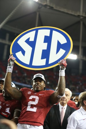 Dec 5, 2015; Atlanta, GA, USA; Alabama Crimson Tide running back Derrick Henry (2) shoes the SEC banner following their win 29-15 over the Florida Gators in the 2015 SEC Championship Game at the Georgia Dome. Mandatory Credit: Butch Dill-USA TODAY Sports