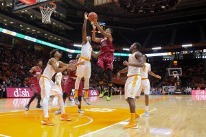 Jan 23, 2016; Knoxville, TN, USA; South Carolina Gamecocks guard PJ Dozier (15) shoots against Tennessee Volunteers forward Ray Kasongo (2)during the first half at Thompson-Boling Arena. Mandatory Credit: Randy Sartin-USA TODAY Sports