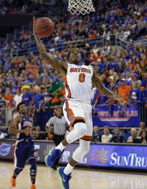Jan 23, 2016; Gainesville, FL, USA; Florida Gators guard Kasey Hill (0) drives to the basket for the dunk during the second half of a basketball game against the Auburn Tigers at Stephen C. O'Connell Center. The Gators won 95-63. Mandatory Credit: Reinhold Matay-USA TODAY Sports