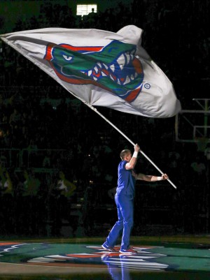 Jan 30, 2016; Gainesville, FL, USA; A Florida Gators cheerleader waves the Gators flag before the first half of a basketball game against the West Virginia Mountaineers at the Stephen C. O'Connell Center. Mandatory Credit: Reinhold Matay-USA TODAY Sports
