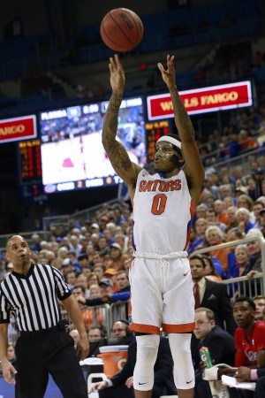 Feb 9, 2016; Gainesville, FL, USA; Florida Gators guard Kasey Hill (0) shoots a three pointer against the Mississippi Rebels during the first half at Stephen C. O'Connell Center. Mandatory Credit: Kim Klement-USA TODAY Sports