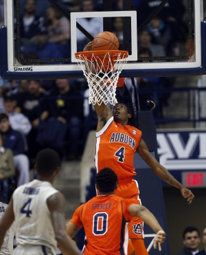 Dec 19, 2015; Cincinnati, OH, USA; Auburn Tigers guard T.J. Dunans (4) dunks during the first half against the Xavier Musketeers at the Cintas Center. Xavier won 85-61. Mandatory Credit: Frank Victores-USA TODAY Sports