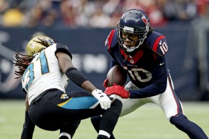 Jan 3, 2016; Houston, TX, USA; Houston Texans wide receiver DeAndre Hopkins (10) looks to get by Jacksonville Jaguars cornerback Davon House (31) during the second half at NRG Stadium. Mandatory Credit: Kevin Jairaj-USA TODAY Sports