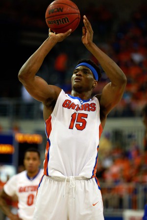 Mar 1, 2016; Gainesville, FL, USA; Florida Gators center John Egbunu (15) shoots a free throw against the Kentucky Wildcats during the first half at Stephen C. O'Connell Center. Mandatory Credit: Kim Klement-USA TODAY Sports