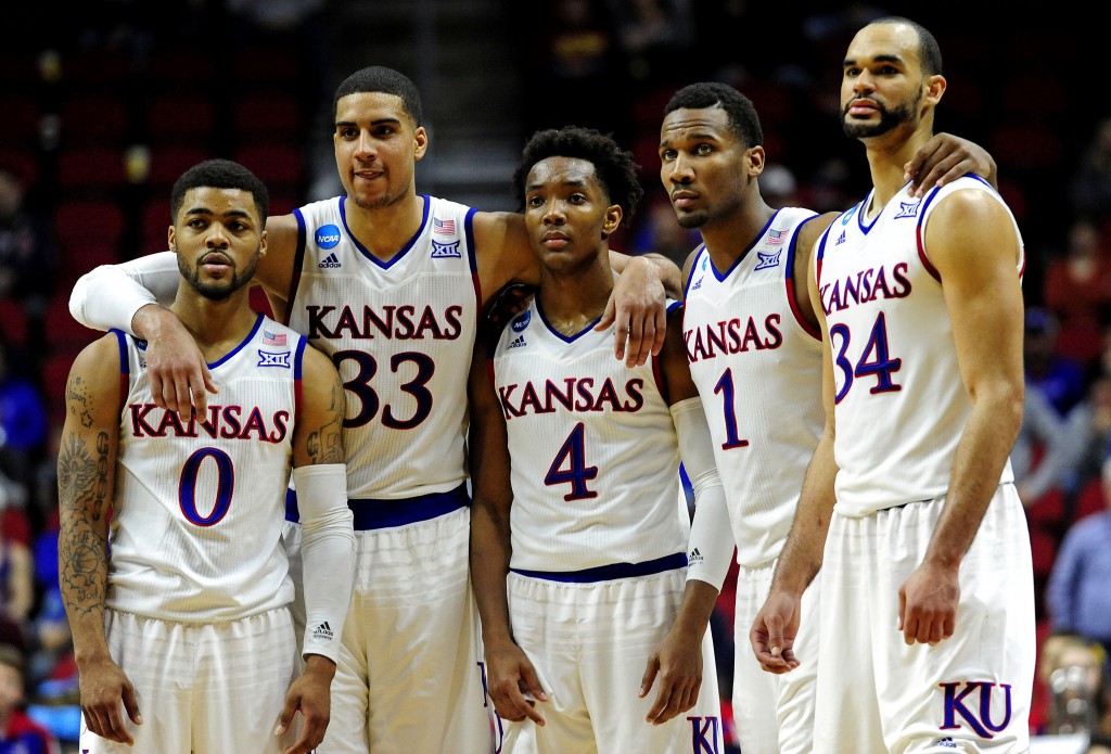 Mar 19, 2016; Des Moines, IA, USA; Kansas Jayhawks guard Frank Mason III (0), forward Landen Lucas (33), guard Devonte' Graham (4), guard Wayne Selden Jr. (1) and forward Perry Ellis (34) on the court in the second half against the Connecticut Huskies during the second round of the 2016 NCAA Tournament at Wells Fargo Arena. Mandatory Credit: Jeffrey Becker-USA TODAY Sports
