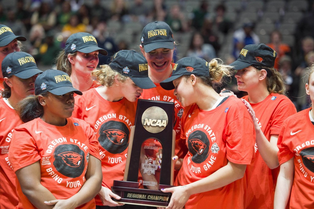 Mar 28, 2016; Dallas, TX, USA; The Oregon State Beavers celebrate the win over the Baylor Bears in the finals of the Dallas regional of the women's NCAA Tournament at American Airlines Center. The Beavers defeated the Bears 60-57. Mandatory Credit: Jerome Miron-USA TODAY Sports