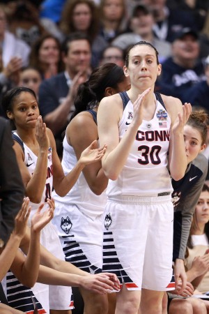 Apr 3, 2016; Indianapolis, IN, USA; Connecticut Huskies forward Breanna Stewart (30) and teammates celebrate from the bench during the final seconds of their game against the Oregon State Beavers at Bankers Life Fieldhouse. The Connecticut Huskies won 80-51. Mandatory Credit: Brian Spurlock-USA TODAY Sports