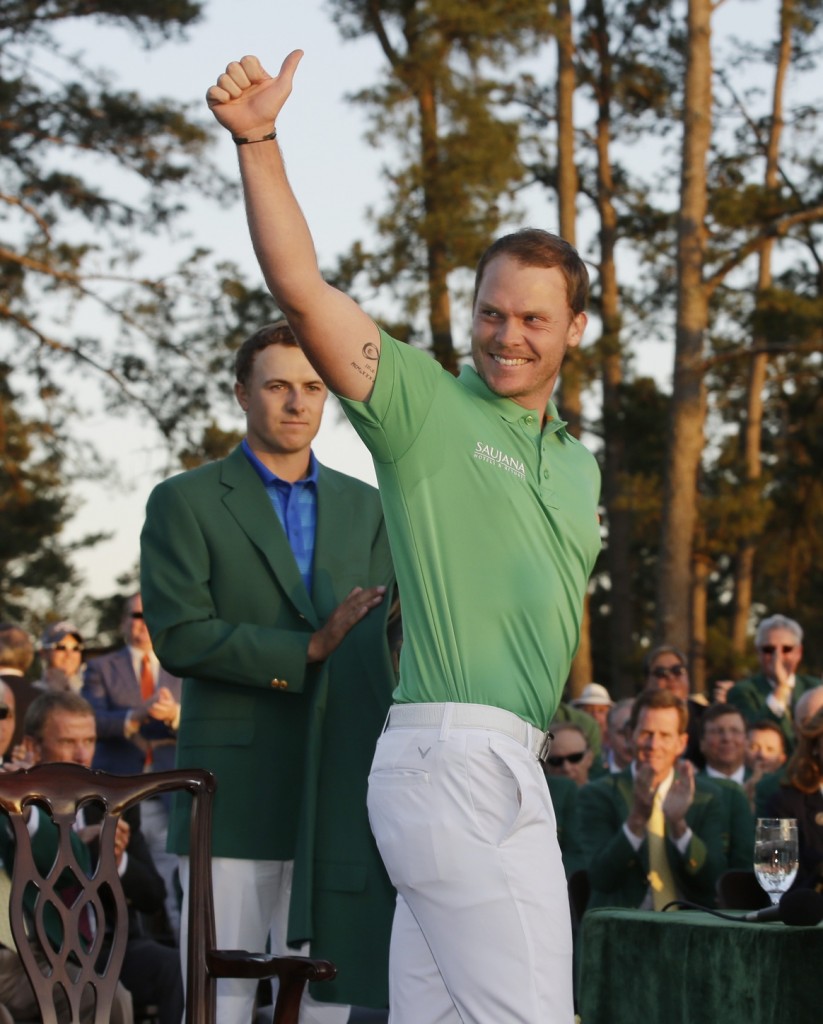 Apr 10, 2016; Augusta, GA, USA; Danny Willett celebrates at the green jacket ceremony in front of Jordan Spieth after the final round of the 2016 The Masters golf tournament at Augusta National Golf Club. Mandatory Credit: Rob Schumacher-USA TODAY Sports