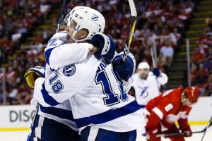 Apr 19, 2016; Detroit, MI, USA; Tampa Bay Lightning left wing Ondrej Palat (18) celebrates his goal during the third period with left wing Jonathan Drouin (27) in game four of the first round of the 2016 Stanley Cup Playoffs against the Detroit Red Wings at Joe Louis Arena. Tampa won 3-2. Mandatory Credit: Rick Osentoski-USA TODAY Sports