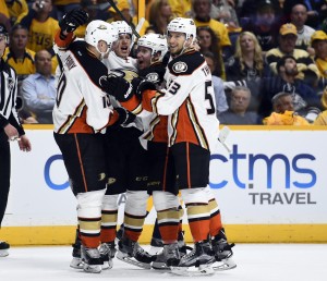 Anaheim Ducks players celebrate after a goal by center Rickard Rakell (67) during the second period against the Nashville Predators in game three of the first round of the 2016 Stanley Cup Playoffs at Bridgestone Arena. Mandatory Credit: Christopher Hanewinckel-USA TODAY Sports