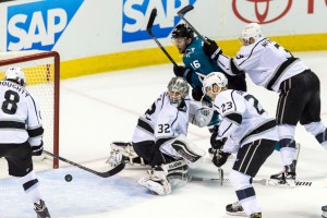 Apr 20, 2016; San Jose, CA, USA; Los Angeles Kings goalie Jonathan Quick (32) deflects a shot by San Jose Sharks center Nick Spaling (16) in the third period of game four of the first round of the 2016 Stanley Cup Playoffs at SAP Center at San Jose. The Sharks won 3-2. Mandatory Credit: John Hefti-USA TODAY Sports