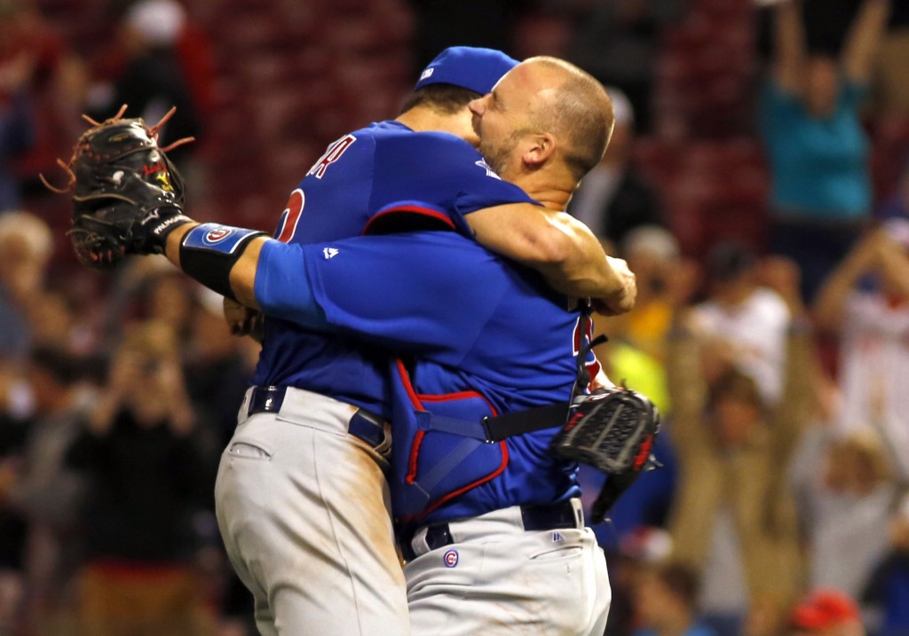Apr 21, 2016; Cincinnati, OH, USA; Chicago Cubs starting pitcher Jake Arrieta (left) is congratulated by catcher David Ross (right) after Arrieta pitched a no-hitter against the Cincinnati Reds at Great American Ball Park. The Cubs won 16-0. Mandatory Credit: David Kohl-USA TODAY Sports