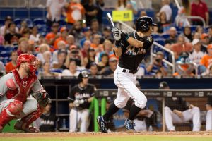 Jul 26, 2016; Miami, FL, USA; Miami Marlins right fielder Ichiro Suzuki (51) hits a single during the eighth inning against the Philadelphia Phillies at Marlins Park. Mandatory Credit: Steve Mitchell-USA TODAY Sports