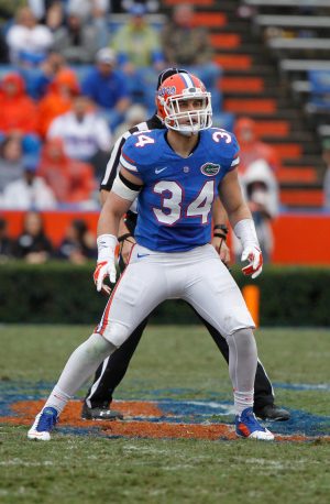 Nov 22, 2014; Gainesville, FL, USA; Florida Gators linebacker Alex Anzalone (34) rushes against the Eastern Kentucky Colonels during the second half at Ben Hill Griffin Stadium. Florida Gators defeated the Eastern Kentucky Colonels 52-3. Mandatory Credit: Kim Klement-USA TODAY Sports