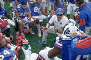 Jan 1, 2016; Orlando, FL, USA; Florida Gators offensive line coach Mike Summers (right center) talks to his players during the second half against the Michigan Wolverines in the 2016 Citrus Bowl at Orlando Citrus Bowl Stadium. Michigan won 41-7. Mandatory Credit: Reinhold Matay-USA TODAY Sports