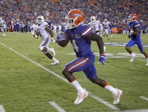 Sep 3, 2016; Gainesville, FL, USA; Florida Gators wide receiver Brandon Powell (4) runs for a touchdown during the second half of a football game against the Massachusetts Minutemen at Ben Hill Griffin Stadium. The Gators won 24-7. Mandatory Credit: Reinhold Matay-USA TODAY Sports