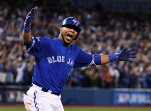 Oct 4, 2016; Toronto, Ontario, CAN; Toronto Blue Jays designated hitter Edwin Encarnacion (10) hits a walk off home run to beat the Baltimore Orioles during the eleventh inning in the American League wild card playoff baseball game at Rogers Centre. Mandatory Credit: Nick Turchiaro-USA TODAY Sports