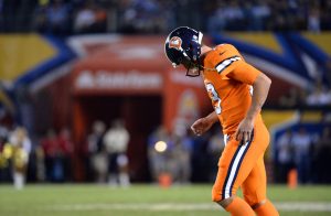 Oct 13, 2016; San Diego, CA, USA; Denver Broncos quarterback Trevor Siemian (13) walks onto the field following a pause in play during the second half of the game against the San Diego Chargers at Qualcomm Stadium. San Diego won 21-13. Mandatory Credit: Orlando Ramirez-USA TODAY Sports