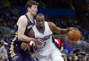 Oct 20, 2016; Orlando, FL, USA; Orlando Magic forward Serge Ibaka (7) drives past New Orleans Pelicans center Omer Asik (3) during the third quarter of a basketball game at Amway Center. Mandatory Credit: Reinhold Matay-USA TODAY Sports
