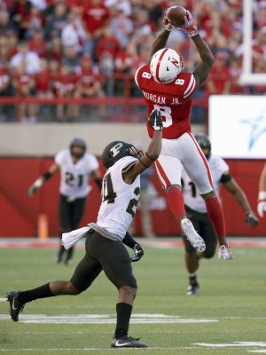 Oct 22, 2016; Lincoln, NE, USA; Nebraska Cornhuskers wide receiver Stanley Morgan Jr. (8) catches a pass defended by Purdue Boilermakers cornerback Tim Cason (24) in the second half at Memorial Stadium. Nebraska won 27-14. Mandatory Credit: Bruce Thorson-USA TODAY Sports