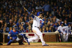 Chicago Cubs first baseman Anthony Rizzo (44) hits a solo home run against the Los Angeles Dodgers during the fifth inning of game six of the NLCS at Wrigley Field. ---Jerry Lai-USA TODAY 