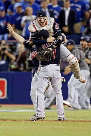 Oct 19, 2016; Toronto, Ontario, CAN; Cleveland Indians catcher Roberto Perez (55) and relief pitcher Cody Allen (37) celebrate beating the Toronto Blue Jays in game five of the 2016 ALCS playoff baseball series at Rogers Centre. Mandatory Credit: John E. Sokolowski-USA TODAY Sports