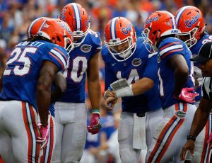  Caption:Oct 15, 2016; Gainesville, FL, USA; Florida Gators quarterback Luke Del Rio (14) huddles up with teammates to call a play against the Missouri Tigers during the second half at Ben Hill Griffin Stadium. Florida Gators defeated the Missouri Tigers 40-14. Mandatory Credit: Kim Klement-USA TODAY Sports