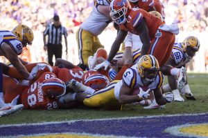 Nov 19, 2016; Baton Rouge, LA, USA; LSU Tigers running back Derrius Guice (5) is stopped short of the goal line on third down against the Florida Gators during the second half at Tiger Stadium. The Gators defeat the Tigers 16-10. Mandatory Credit: Jerome Miron-USA TODAY Sports