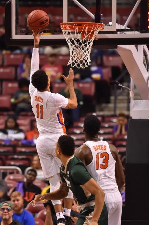 Dec 17, 2016; Sunrise, FL, USA; Florida Gators guard Chris Chiozza (11) attempts a lay up against the Charlotte 49ers during the first half at BB&T Center. Mandatory Credit: Jasen Vinlove-USA TODAY Sports