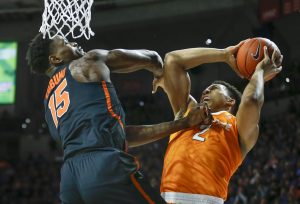 Jan 7, 2017; Gainesville, FL, USA; Florida Gators center John Egbunu (15) tries to block the shot from Tennessee Volunteers forward Grant Williams (2) during the first half of an NCAA men's basketball game in the Exactech Arena at the Stephen C. O'Connell Center. Mandatory Credit: Reinhold Matay-USA TODAY Sports