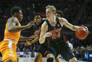 Jan 7, 2017; Gainesville, FL, USA; Florida Gators guard Canyon Barry (24) drives up to Tennessee Volunteers forward Admiral Schofield (5) during the first half of an NCAA men's basketball game in the Exactech Arena at the Stephen C. O'Connell Center. Mandatory Credit: Reinhold Matay-USA TODAY Sports