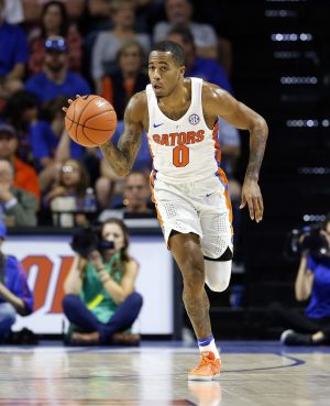 Jan 14, 2017; Gainesville, FL, USA; Florida Gators guard Kasey Hill (0) dribbles the ball against the Georgia Bulldogs during the first half at Exactech Arena at the Stephen C. O'Connell Ce. Mandatory Credit: Kim Klement-USA TODAY Sports