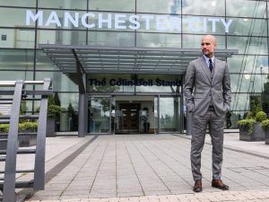 MANCHESTER, ENGLAND - JULY 08: Manchester City's manager Pep Guardiola poses for photographs outside the Etihad Stadium on July 8, 2016 in Manchester, England. (Photo by Barrington Coombs/Getty Images)