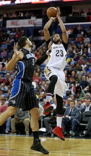 Jan 18, 2017; New Orleans, LA, USA; New Orleans Pelicans forward Anthony Davis (23) shoots over Orlando Magic center Nikola Vucevic (9) in the second half at the Smoothie King Center. The Pelicans won 118-98. Mandatory Credit: Chuck Cook-USA TODAY Sports