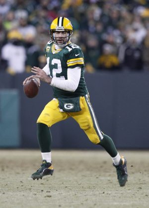 Jan 8, 2017; Green Bay, WI, USA; Green Bay Packers quarterback Aaron Rodgers (12) drops back to pass against the New York Giants during the second half in the NFC Wild Card playoff football game at Lambeau Field. Mandatory Credit: Jeff Hanisch-USA TODAY Sports