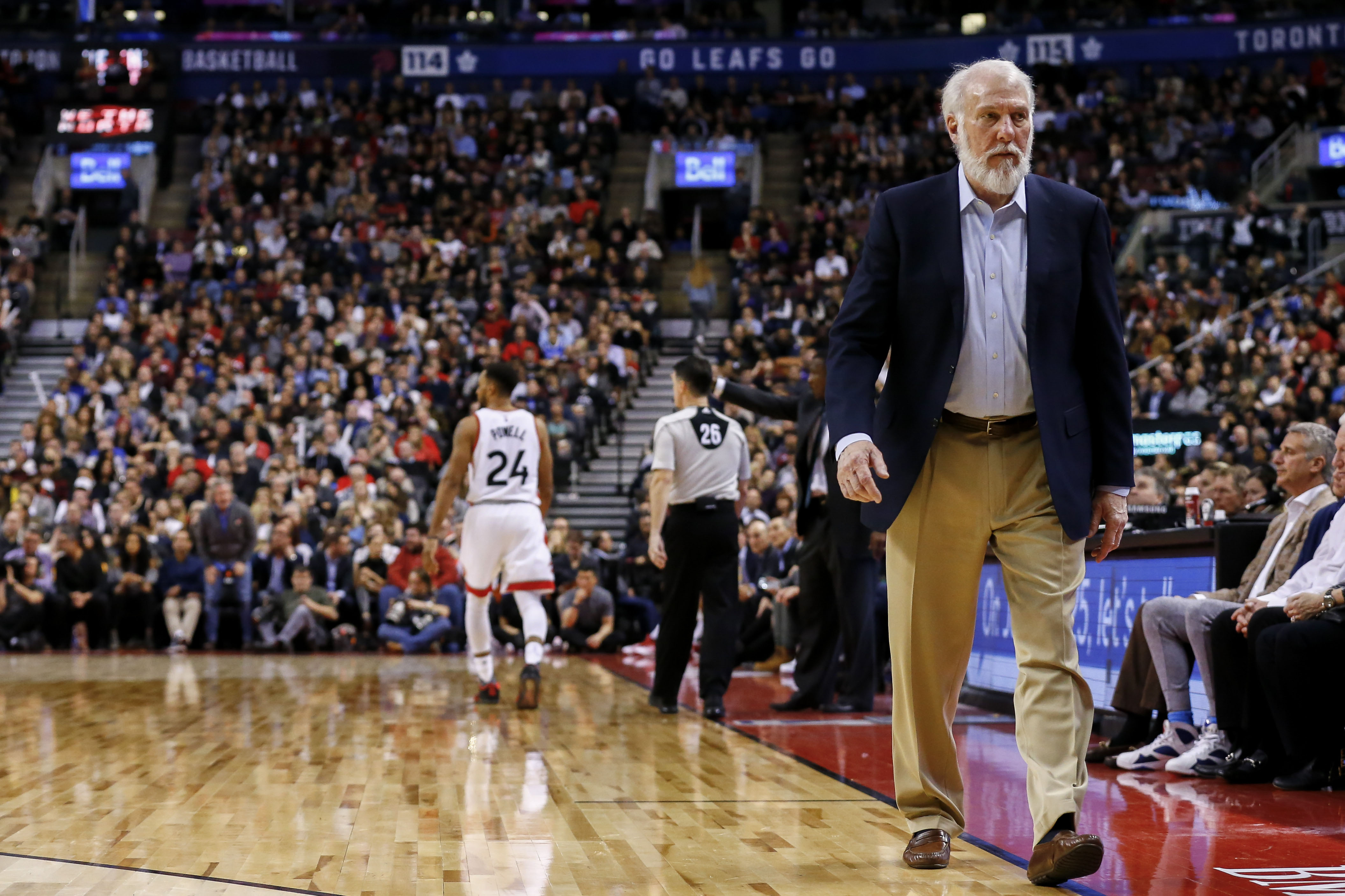 Jan 24, 2017; Toronto, Ontario, CAN; San Antonio Spurs head coach Gregg Popovich walks back to the bench in the second half at an NBA game against the Toronto Raptors at Air Canada Centre. The Spurs won 108-106. Mandatory Credit: Kevin Sousa-USA TODAY Sports