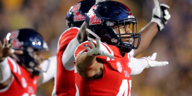 Ole Miss players celebrate after a missed field goal by LSU