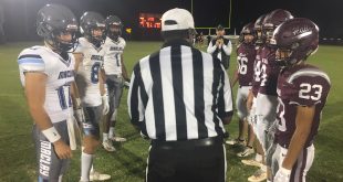 Maclay and Oak Hall captains line up for coin toss prior to game