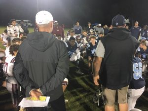 Oak Hall and Foundation Academy coaches talk to players