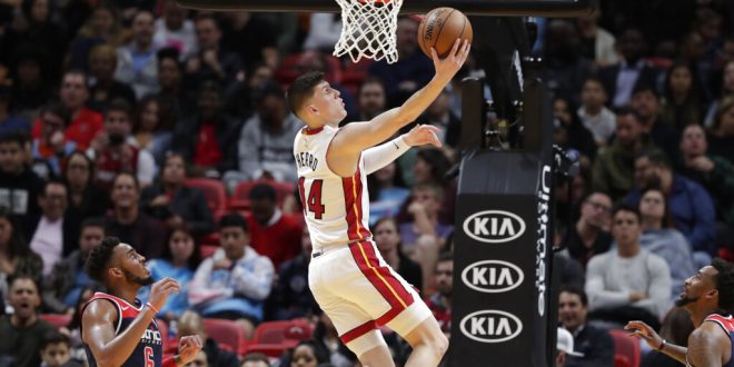 Tyler Herro shoots a layup