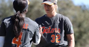 Gator softball players shake hands