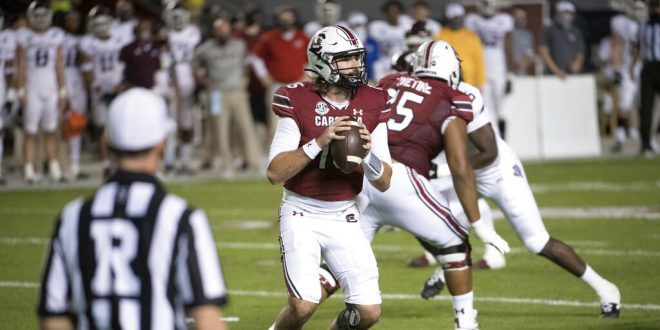 South Carolina quarterback drops to pass