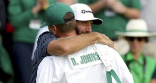 Dustin Johnson hugs brother