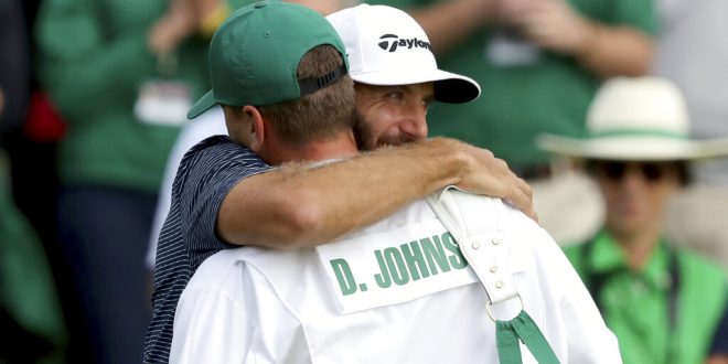 Dustin Johnson hugs brother