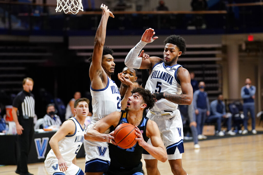 College Hoops Top 25: Iowa bounces back, Villanova and Virginia stay hot - Vimarsana News