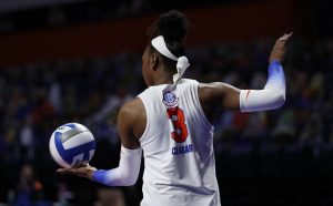 T'ara Ceasar serving in Saturday's Gators Volleyball match against Arkansas