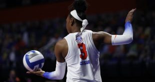 T'ara Ceasar serving in Saturday's Gators Volleyball match against Arkansas